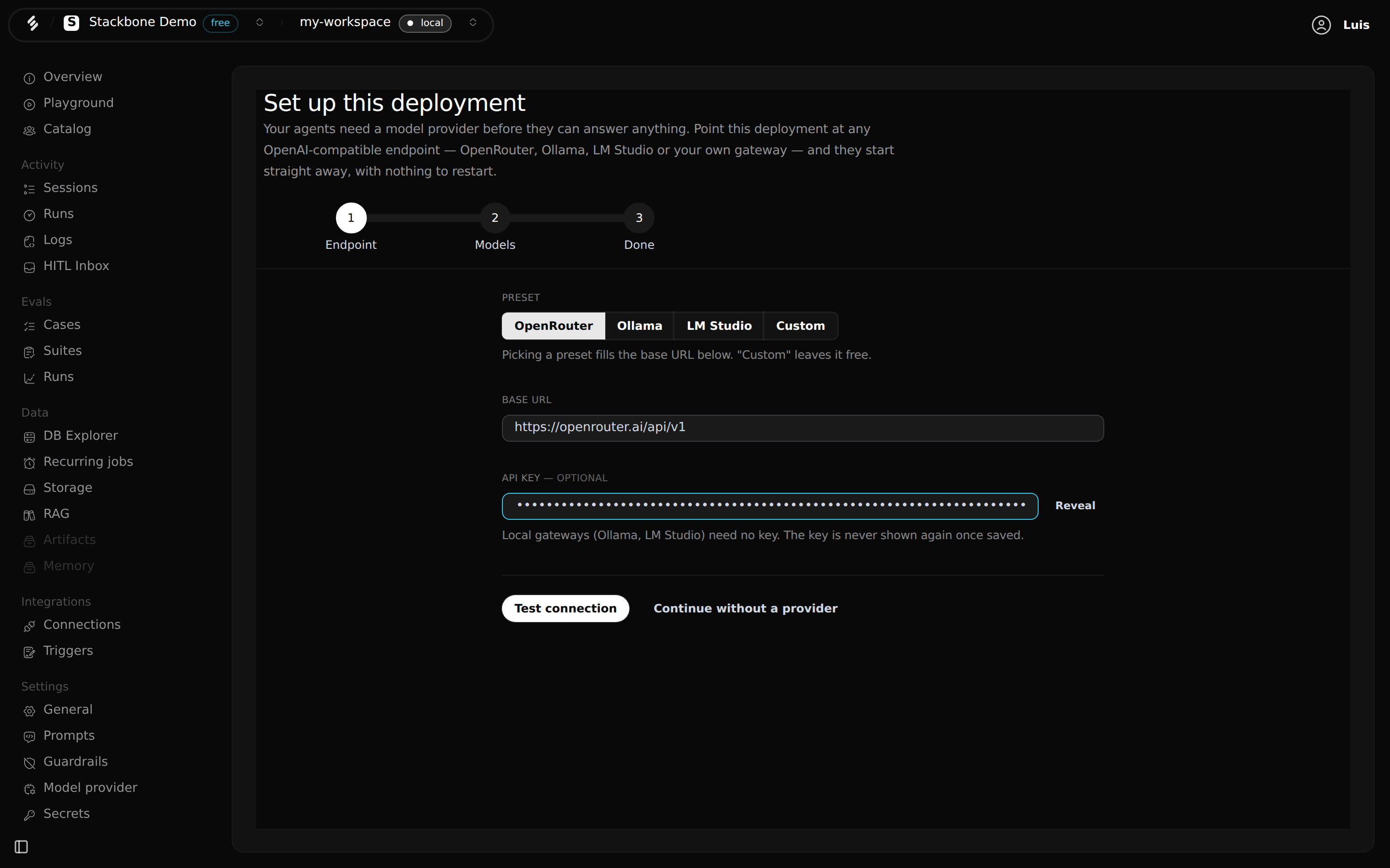 Step one of the Studio setup: the preset buttons, the base URL filled with the OpenRouter address, and a masked API key.