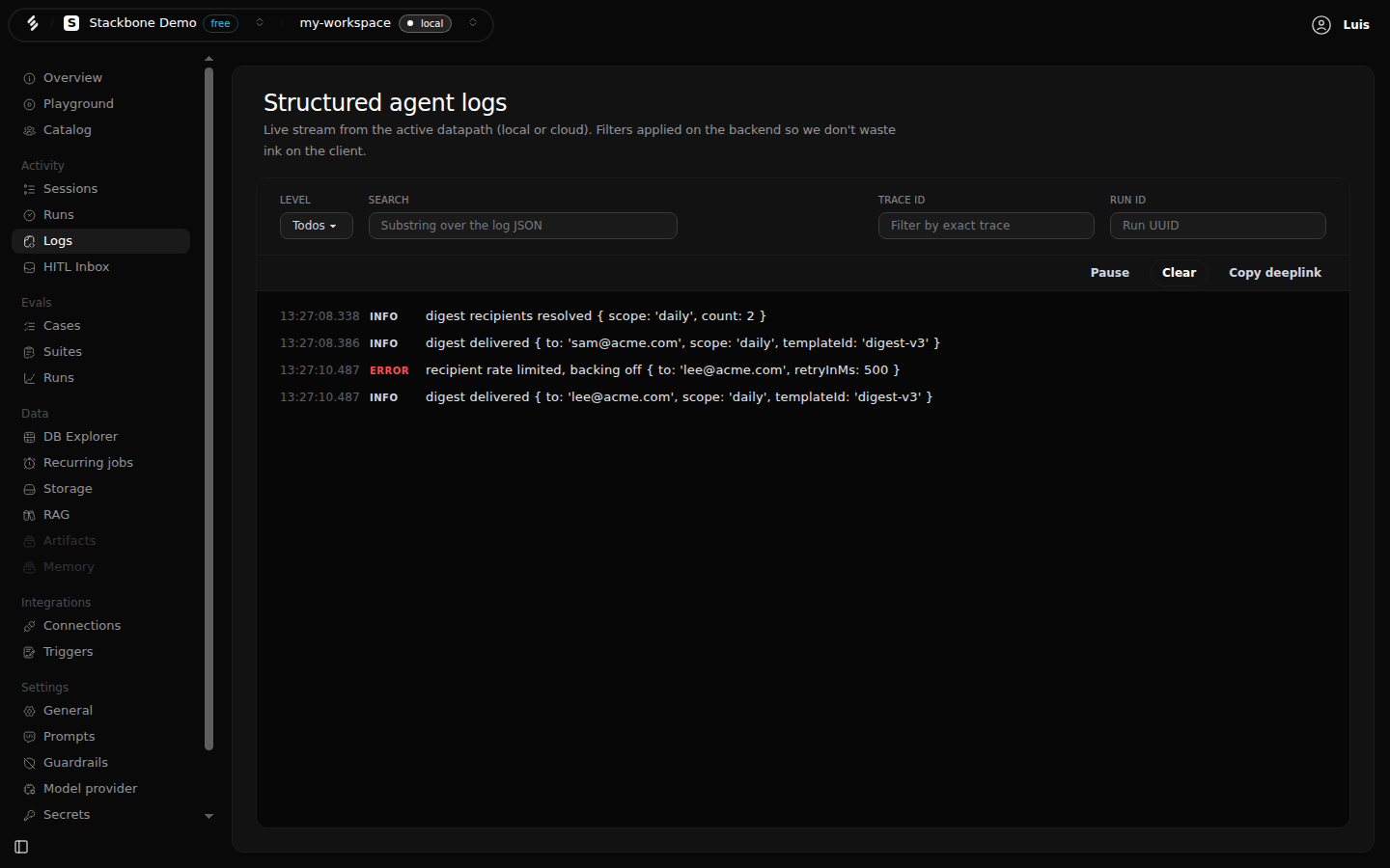 The live tail of the Logs screen in Studio: four lines printed by the steps of a workflow run, one at error level, with the level, search, trace id and run id filters above.